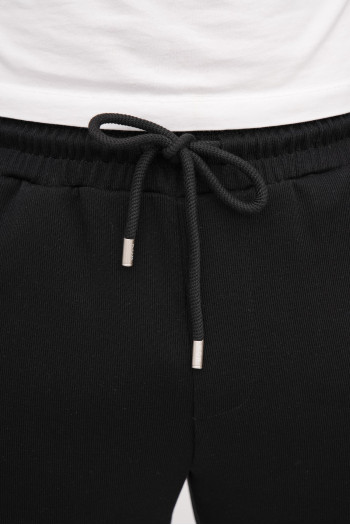 Спорт-штани однотонні K.O.R 37991 Чорний (black)